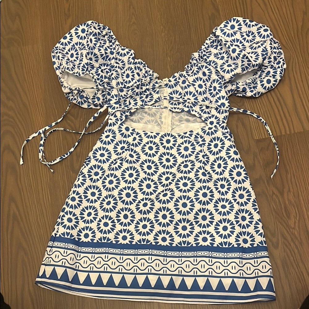 Blue and White Dress with puffy sleeves and ties in front